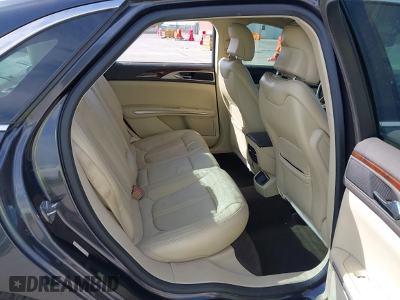 2014 Lincoln MKZ with VIN 3LN6L2GK7ER819756, listed as a IAAI auction lot 42242399 with 140,483 mi miles and . Bid and sale history available at DreamBid. Image 8.