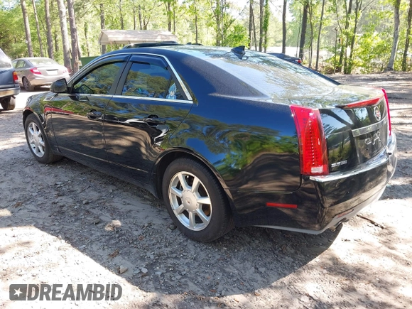 2009 Cadillac CTS RWD w/1SB with VIN 1G6DU57V590105458, listed as a IAAI auction lot 42139093 with 105,983 mi miles. Bid and sale history available at carsss.com. Image 3.