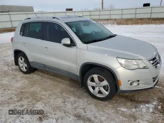 2010 Volkswagen Tiguan SEL with VIN WVGBV7AX2AW528387, listed as a Copart auction lot 87952095 with 110,249 mi miles and Non Repairable. Bid and sale history available at DreamBid. Image 4.