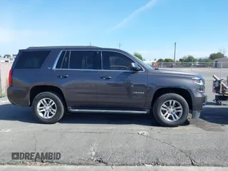 2016 Chevrolet Tahoe LS with VIN 1GNSCAKC2GR110249, listed as a IAAI auction lot 41583619 with 65,542 mi miles and . Bid and sale history available at DreamBid. Image 13.