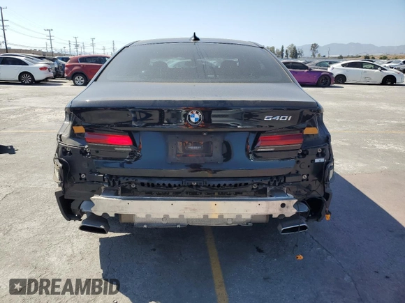 2021 BMW 5 Series 540i with VIN WBA53BJ05MWW92487, listed as a Copart auction lot 57679975 with 53,311 mi miles and Salvage title. Bid and sale history available at DreamBid. Image 6.