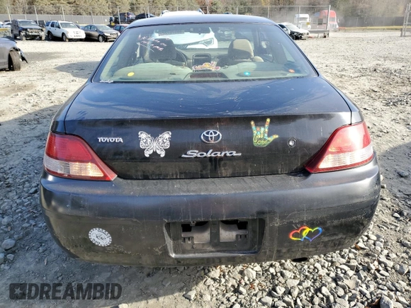 1999 Toyota Solara SE with VIN 2T1CG22P1XC195671, listed as a Copart auction lot 80575724 with 185,634 mi miles and Salvage Title. Bid and sale history available at DreamBid. Image 6.