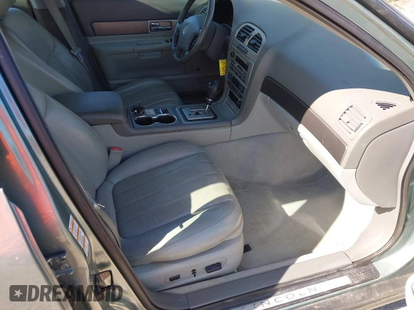 2003 Lincoln LS Sport with VIN 1LNHM87A33Y677386, listed as a IAAI auction lot 41890308 with 139,498 mi miles. Bid and sale history available at carsss.com. Image 5.