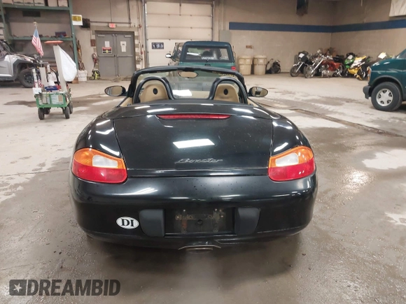 1999 Porsche Boxster z VIN WP0CA2984XU622814, wystawiony jako IAAI lot #42234977 z przebiegiem 52 404 mil mil oraz . Historia ofert i sprzedaży dostępna na DreamBid. Obrazek 15.