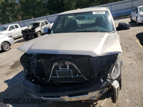 2004 Chevrolet Silverado 1500 LS with VIN 1GCEC14T34Z189252, listed as a Copart auction lot 77065754 with 0 mi miles and Salvage Title. Bid and sale history available at carsss.com. Image 5.