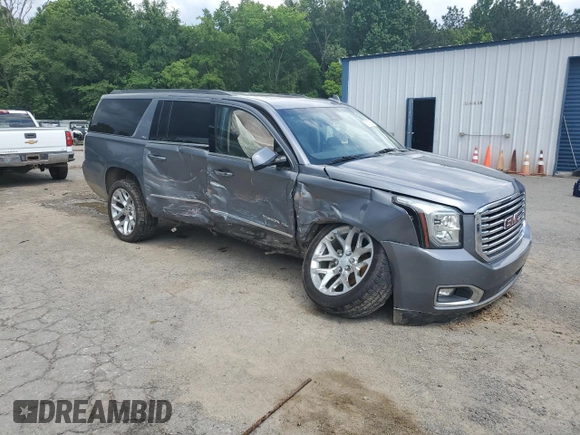 2019 GMC Yukon XL SLT z VIN 1GKS1GKC0KR325305, wystawiony jako Copart lot #56219325 z przebiegiem 136 295 mil mil oraz Szkoda całkowita • Salvage title. Historia ofert i sprzedaży dostępna na DreamBid. Obrazek 4.