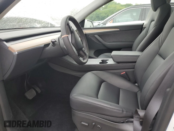 2022 Tesla Model Y Long Range z VIN 7SAYGDEE5NA016276, wystawiony jako Copart lot #55942355 z przebiegiem 14 085 mil mil oraz Szkody całkowita. Historia ofert i sprzedaży dostępna na DreamBid. Obrazek 7.