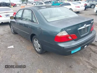 2003 Toyota Avalon XL with VIN 4T1BF28B63U294358, listed as a IAAI auction lot 42226470 with 256,405 mi miles and . Bid and sale history available at carsss.com. Image 3.