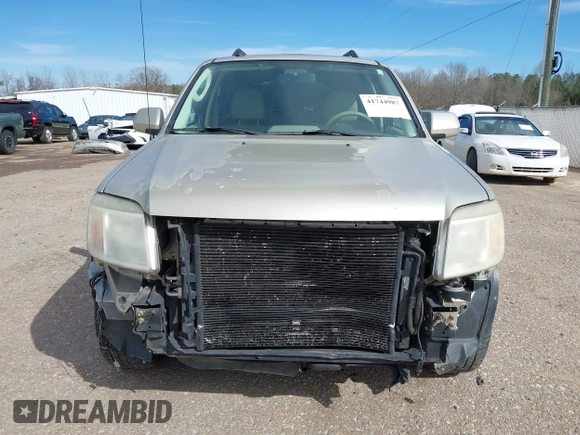 2010 Mercury Mariner Premier with VIN 4M2CN8HG4AKJ05736, listed as a IAAI auction lot 41744987 with 209,819 mi miles and . Bid and sale history available at DreamBid. Image 13.