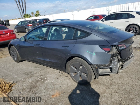 2023 Tesla Model 3 with VIN 5YJ3E1EA3PF541593, listed as a Copart auction lot 43926455 with 26,593 mi miles and Salvage title. Bid and sale history available at DreamBid. Image 2.