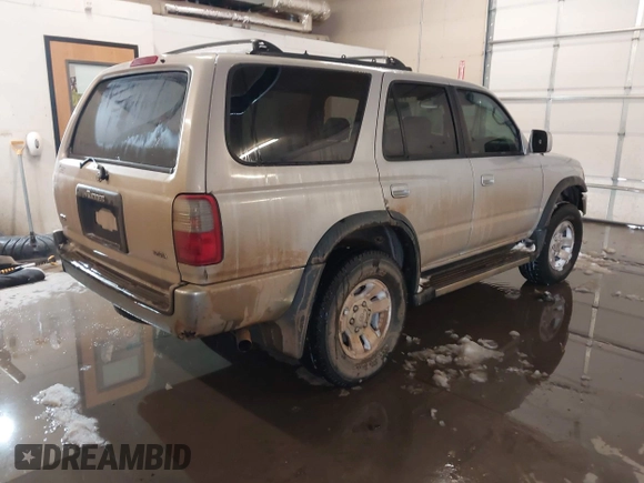 1998 Toyota 4Runner SR5 with VIN JT3HN86R1W0183463, listed as a IAAI auction lot 41515690 with 299,355 mi miles and . Bid and sale history available at DreamBid. Image 4.