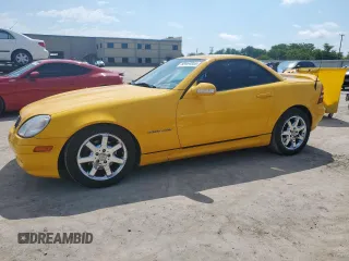 2002 Mercedes-Benz SLK 230 Kompressor with VIN WDBKK49F72F270200, listed as a Copart auction lot 60464855 with 59,848 mi miles and Salvage title. Bid and sale history available at DreamBid. Image 1.