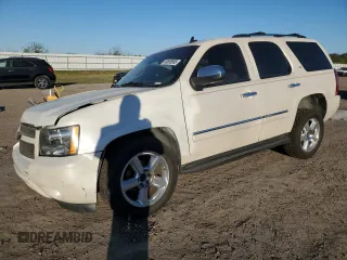2009 Chevrolet Tahoe LTZ z VIN 1GNFC33069R222881, wystawiony jako Copart lot #49809895 z przebiegiem 148 351 mil mil oraz Szkoda całkowita • Salvage title. Historia ofert i sprzedaży dostępna na DreamBid. Obrazek 1.