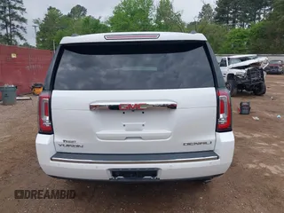 2016 GMC Yukon Denali with VIN 1GKS1CKJ7GR237852, listed as a IAAI auction lot 41944398 with 65,703 mi miles. Bid and sale history available at carsss.com. Image 17.