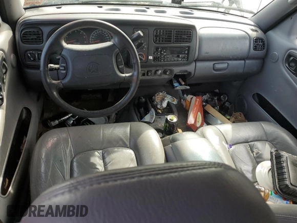 1999 Dodge Durango z VIN 1B4HS28Z3XF645192, wystawiony jako Copart lot #51225145 z przebiegiem Nie podano mil oraz Czysty tytuł • Clean title. Historia ofert i sprzedaży dostępna na DreamBid. Obrazek 8.