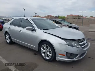 2012 Ford Fusion SE with VIN 3FAHP0HA3CR291485, listed as a IAAI auction lot 42029338 with 153,217 mi miles and . Bid and sale history available at DreamBid. Image 1.