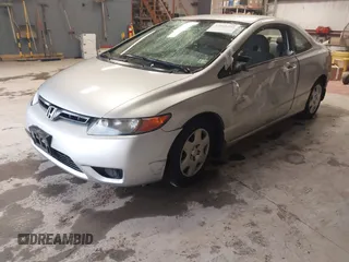 2006 Honda Civic Cpe LX with VIN 2HGFG126X6H532696, listed as a IAAI auction lot 42016264 with 209,509 mi miles. Bid and sale history available at carsss.com. Image 18.