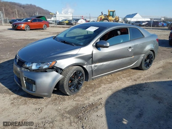 2010 Kia Forte Koup SX with VIN KNAFW6A38A5267375, listed as a IAAI auction lot 41699378 with 174,880 mi miles. Bid and sale history available at carsss.com. Image 2.