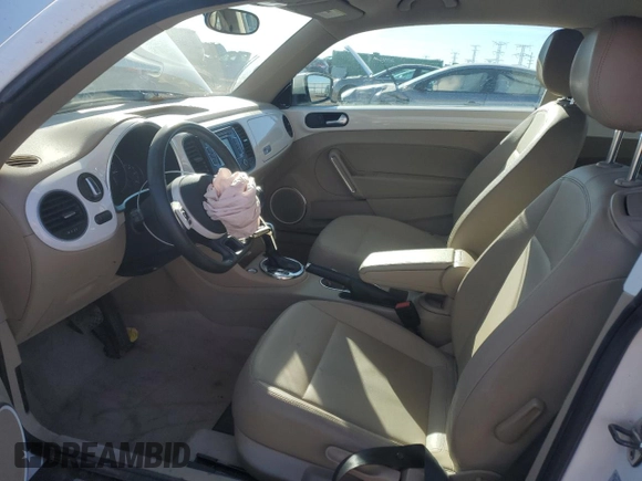 2012 Volkswagen Beetle 2.5L w/Sound/Nav PZEV with VIN 3VWJP7AT4CM657836, listed as a Copart auction lot 43065845 with 96,854 mi miles and Salvage Title. Bid and sale history available at DreamBid. Image 7.