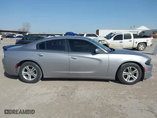 2017 Dodge Charger SE with VIN 2C3CDXBGXHH541198, listed as a IAAI auction lot 41831091 with 141,669 mi miles. Bid and sale history available at carsss.com. Image 13.