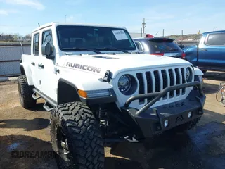 2021 Jeep Gladiator Rubicon z VIN 1C6JJTBG4ML536085, wystawiony jako IAAI lot #41898204 z przebiegiem 39 627 mil mil oraz . Historia ofert i sprzedaży dostępna na DreamBid. Obrazek 1.