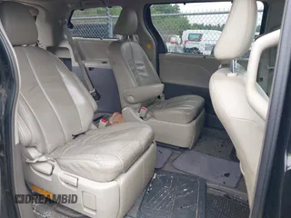 2012 Toyota Sienna XLE z VIN 5TDDK3DC8CS044847, wystawiony jako IAAI lot #42392549 z przebiegiem 157 220 mil mil oraz . Historia ofert i sprzedaży dostępna na DreamBid. Obrazek 8.
