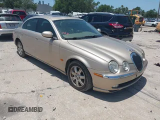 2004 Jaguar S-Type z VIN SAJEA01T94FN12064, wystawiony jako IAAI lot #41928836 z przebiegiem 158 701 mil mil oraz . Historia ofert i sprzedaży dostępna na DreamBid. Obrazek 1.