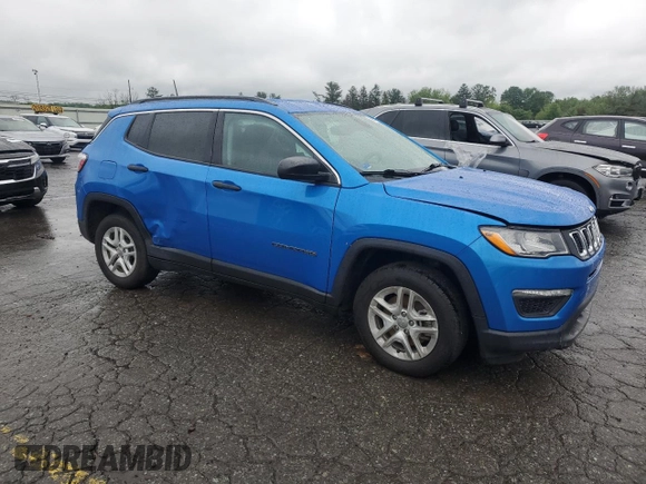 2021 Jeep Compass Sport with VIN 3C4NJCAB6MT518465, listed as a Copart auction lot 56797435 with 82,089 mi miles and Salvage title. Bid and sale history available at DreamBid. Image 4.