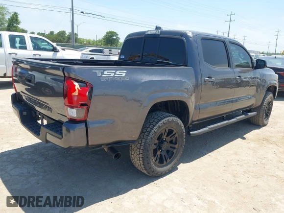 2021 Toyota Tacoma SR with VIN 3TYAX5GN3MT015565, listed as a IAAI auction lot 42241436 with 46,921 mi miles and . Bid and sale history available at DreamBid. Image 4.