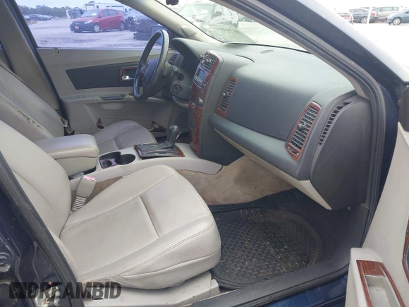 2005 Cadillac CTS with VIN 1G6DM56T750224106, listed as a IAAI auction lot 41393894 with 230,524 mi miles. Bid and sale history available at carsss.com. Image 5.