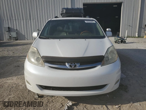 2008 Toyota Sienna XLE z VIN 5TDZK22CX8S122829, wystawiony jako Copart lot #58202065 z przebiegiem 228 678 mil mil oraz Szkoda całkowita • Salvage title. Historia ofert i sprzedaży dostępna na DreamBid. Obrazek 5.