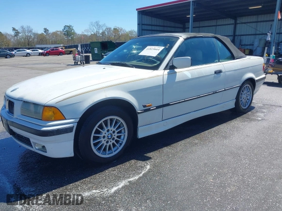1996 BMW 3-Series 328IC with VIN WBABK8324TET92418, listed as a IAAI auction lot 41815664 with 128,661 mi miles. Bid and sale history available at carsss.com. Image 2.