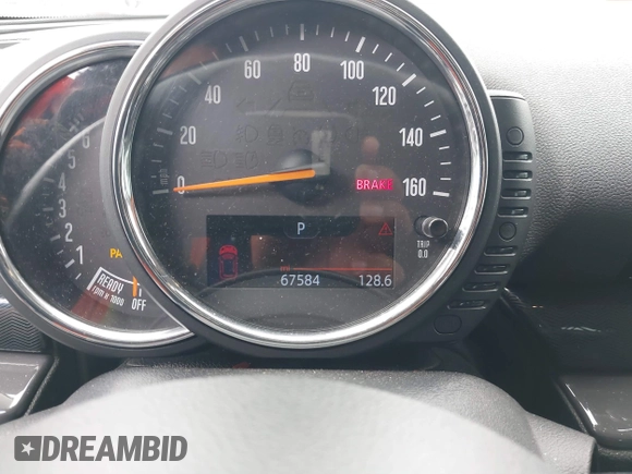 2016 MINI Clubman z VIN WMWLN5C56G2E30309, wystawiony jako IAAI lot #41772501 z przebiegiem 67 584 mil mil oraz . Historia ofert i sprzedaży dostępna na DreamBid. Obrazek 12.