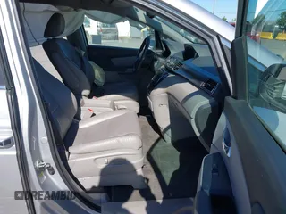 2014 Honda Odyssey EX-L with VIN 5FNRL5H63EB041106, listed as a IAAI auction lot 42294113 with 122,610 mi miles and . Bid and sale history available at DreamBid. Image 5.