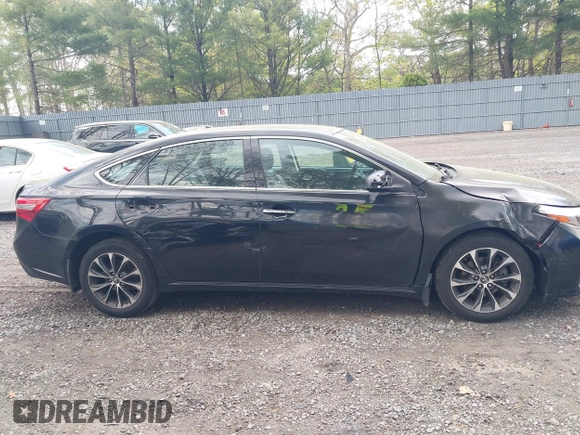 2016 Toyota Avalon Limited with VIN 4T1BK1EB2GU228678, listed as a IAAI auction lot 42161073 with 207,976 mi miles and . Bid and sale history available at carsss.com. Image 13.