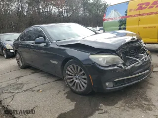 2012 BMW 7 Series 750i xDrive with VIN WBAKC6C52CC396443, listed as a Copart auction lot 44333945 with 134,075 mi miles and Salvage Title. Bid and sale history available at carsss.com. Image 4.