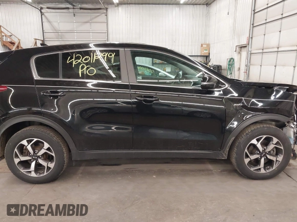 2020 Kia Sportage LX with VIN KNDPMCACXL7804797, listed as a IAAI auction lot 42011299 with 49,793 mi miles and . Bid and sale history available at carsss.com. Image 14.
