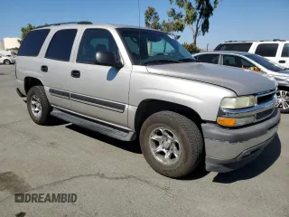 2005 Chevrolet Tahoe LT with VIN 1GNEC13T35R103206, listed as a Copart auction lot 74310784 with 128,780 mi miles and Salvage Title. Bid and sale history available at carsss.com. Image 4.