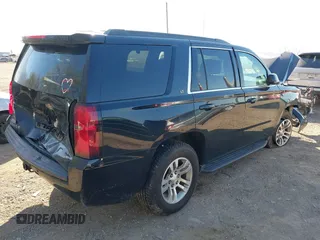 2016 Chevrolet Tahoe LT with VIN 1GNSKBKCXGR393105, listed as a IAAI auction lot 42039456 with 94,417 mi miles and . Bid and sale history available at DreamBid. Image 4.