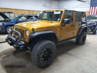 2014 Jeep Wrangler Unlimited Rubicon X with VIN 1C4BJWFG7EL300380, listed as a Copart auction lot 62538515 with 128,610 mi miles and Clean title. Bid and sale history available at DreamBid. Image 1.