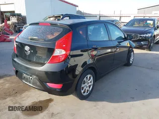 2013 Hyundai Accent GS z VIN KMHCT5AE7DU083304, wystawiony jako IAAI lot #41847588 z przebiegiem 133 971 mil mil oraz . Historia ofert i sprzedaży dostępna na DreamBid. Obrazek 4.