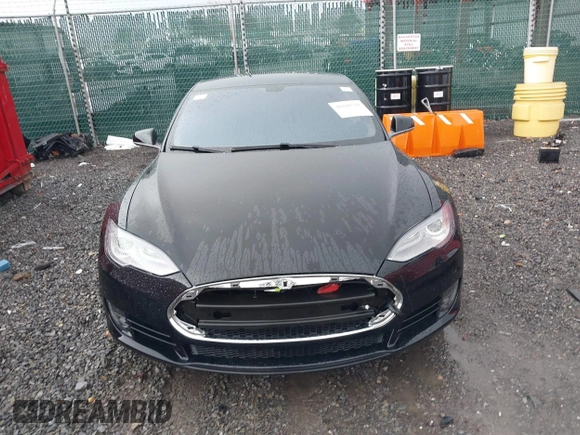 2014 Tesla Model S 60 with VIN 5YJSA1H18EFP28053, listed as a IAAI auction lot 41191521 with 82,207 mi miles and . Bid and sale history available at DreamBid. Image 11.