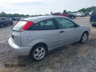 2006 Ford Focus S z VIN 1FAFP31NX6W160335, wystawiony jako IAAI lot #42377929 z przebiegiem 190 901 mil mil oraz . Historia ofert i sprzedaży dostępna na DreamBid. Obrazek 4.