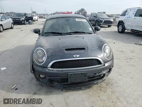 2014 MINI Coupe S z VIN WMWSX3C59ET773064, wystawiony jako Copart lot #42989015 z przebiegiem 135 005 mil mil oraz Szkoda całkowita • Salvage title. Historia ofert i sprzedaży dostępna na DreamBid. Obrazek 10.