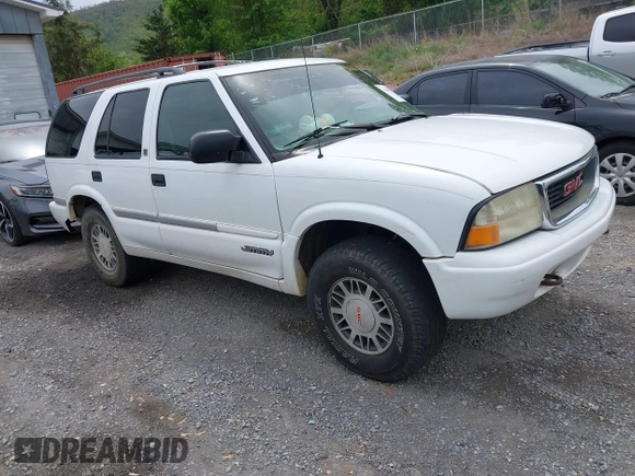 1999 GMC Jimmy SLE with VIN 1GKDT13WXX2521082, listed as a IAAI auction lot 42079903 with 160,055 mi miles. Bid and sale history available at carsss.com. Image 1.