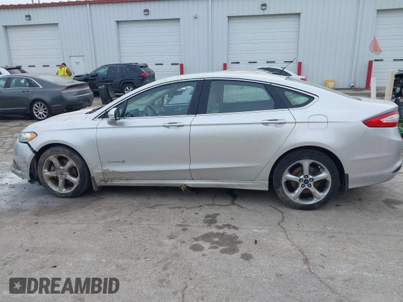 2014 Ford Fusion SE Hybrid with VIN 3FA6P0LU7ER176612, listed as a IAAI auction lot 41456075 with 101,621 mi miles and . Bid and sale history available at DreamBid. Image 13.