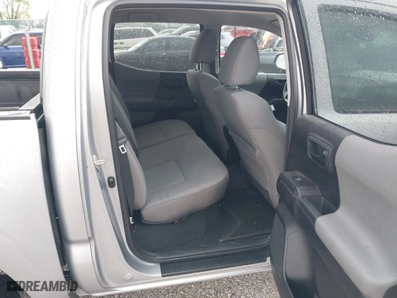2020 Toyota Tacoma 4WD SR5 with VIN 3TMCZ5AN2LM300117, listed as a IAAI auction lot 41874864 with 59,594 mi miles. Bid and sale history available at carsss.com. Image 8.