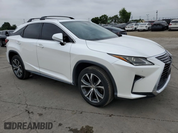 2016 Lexus RX 350 with VIN 2T2ZZMCA0GC024433, listed as a Copart auction lot 59923845 with 69,552 mi miles and Salvage title. Bid and sale history available at DreamBid. Image 4.