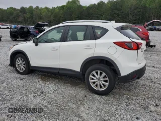 2016 Mazda CX-5 Sport with VIN JM3KE2BY0G0843786, listed as a Copart auction lot 54451275 with 111,363 mi miles and Salvage title. Bid and sale history available at DreamBid. Image 2.