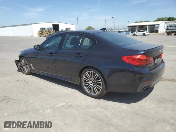 2019 BMW 5 Series M550i xDrive with VIN WBAJB9C5XKB287877, listed as a Copart auction lot 52994065 with 52,460 mi miles and Salvage title. Bid and sale history available at DreamBid. Image 2.